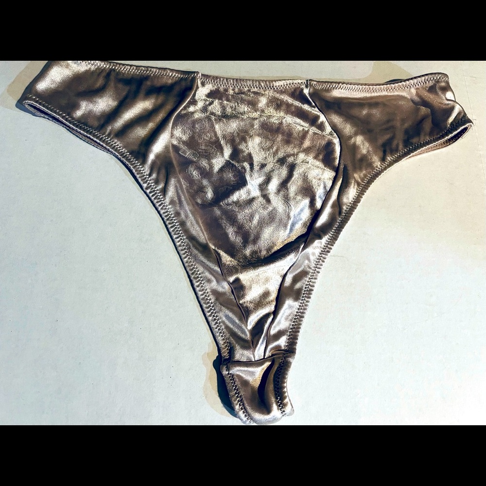 Thong/panties no brand listed on inside rag. New without tags. Never worn.